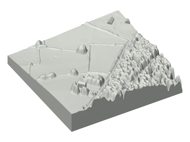 Rendu réel d'une maquette FACMAC couvrant un quartier de 250 mètres avec relief, bâtiments et végétation